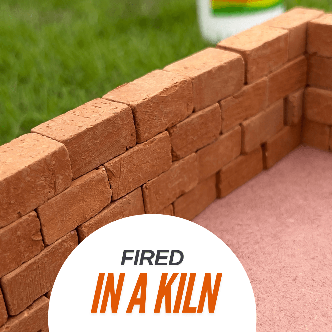 Close-up of a miniature terracotta brick wall