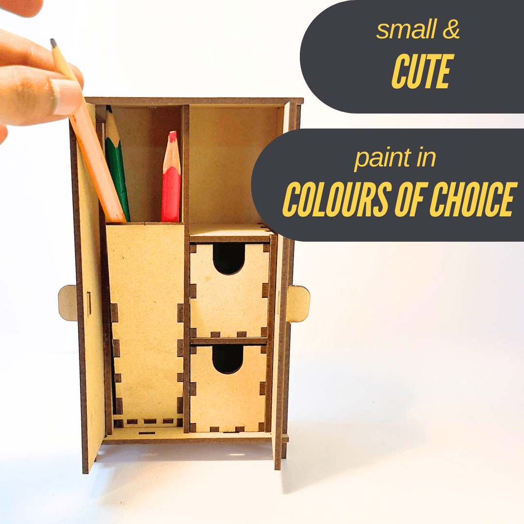 Miniature cupboard showing useful storage for pens and supplies